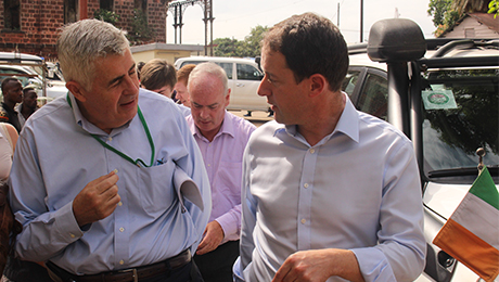 Minister Sherlock with Concern CEO Dominic MacSorley at an Ebola Command Centre in Freetown